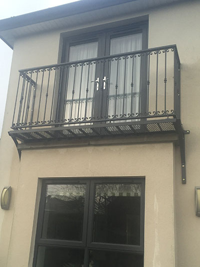 Metal balcony with double doors