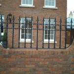 brick and iron rail